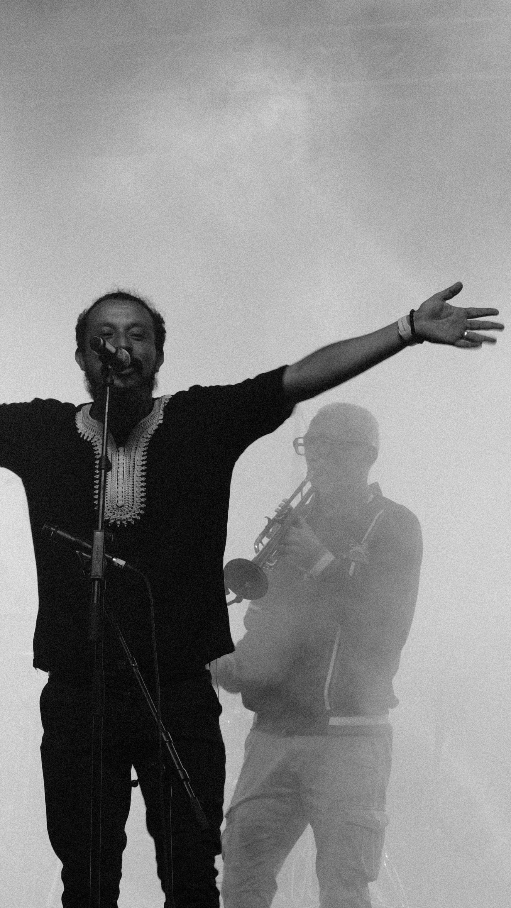 Dramatic black and white performer silhouette