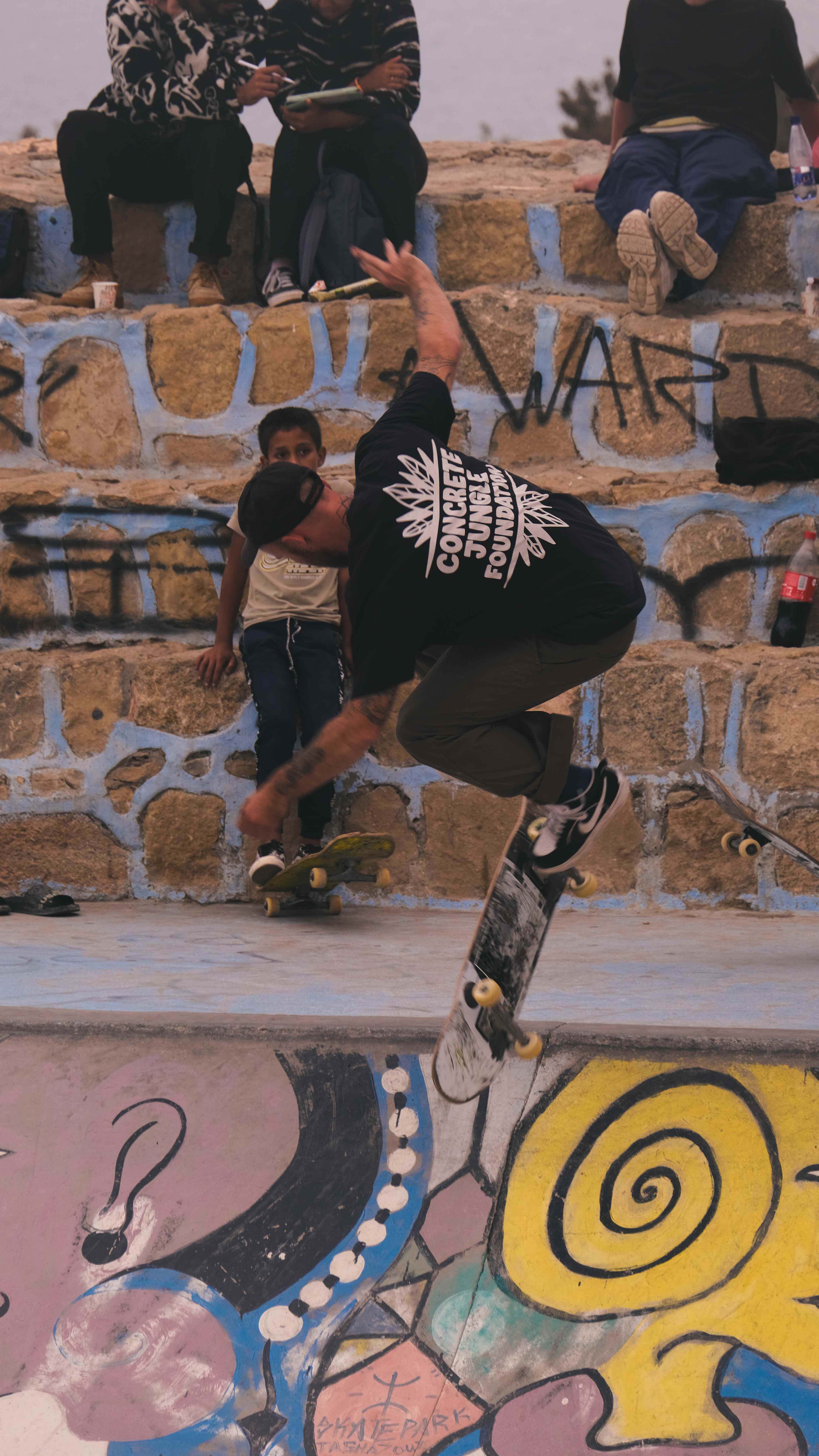 Skateboarding action at concrete skate park