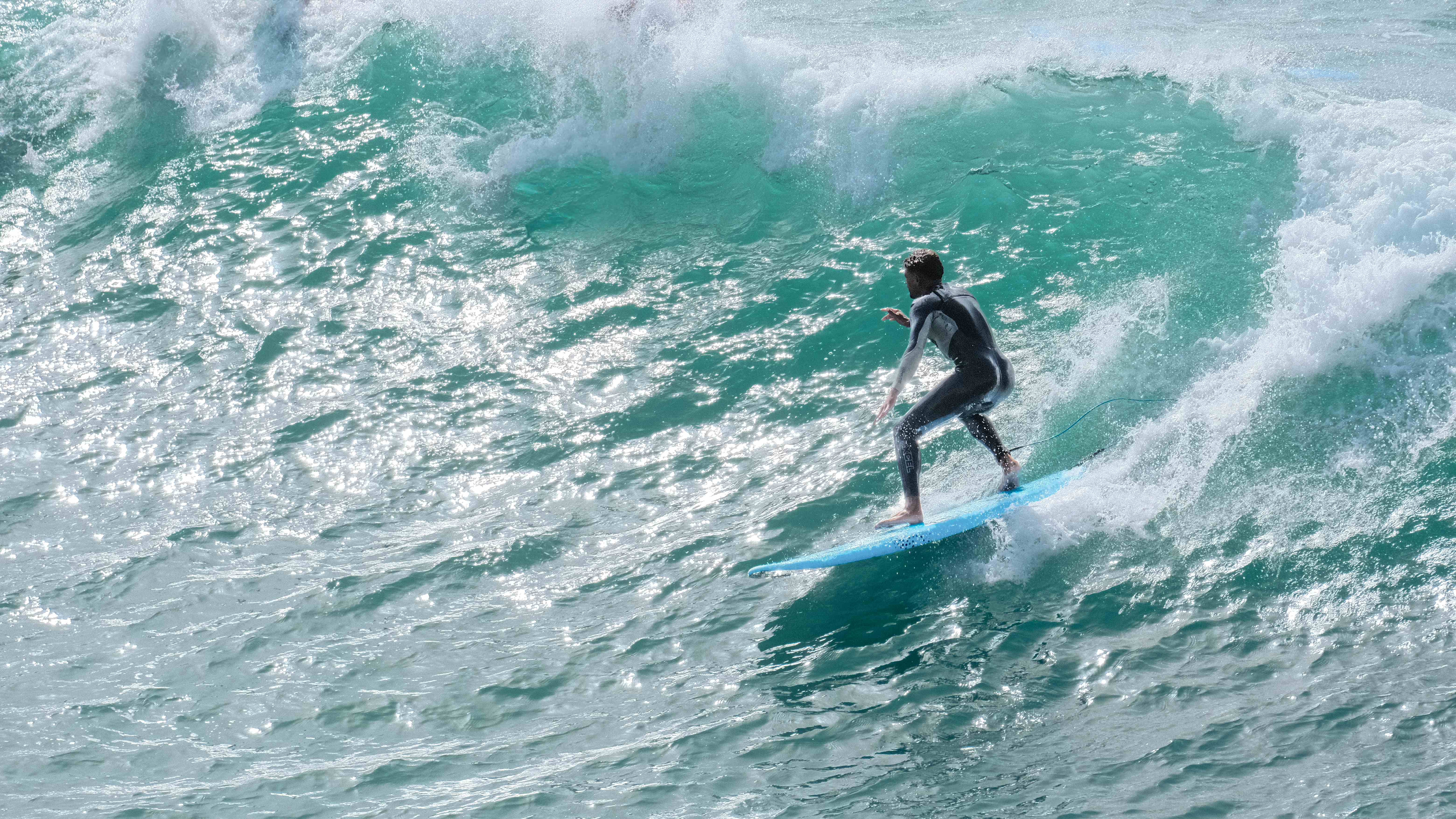 Action sports photography - surfer on wave